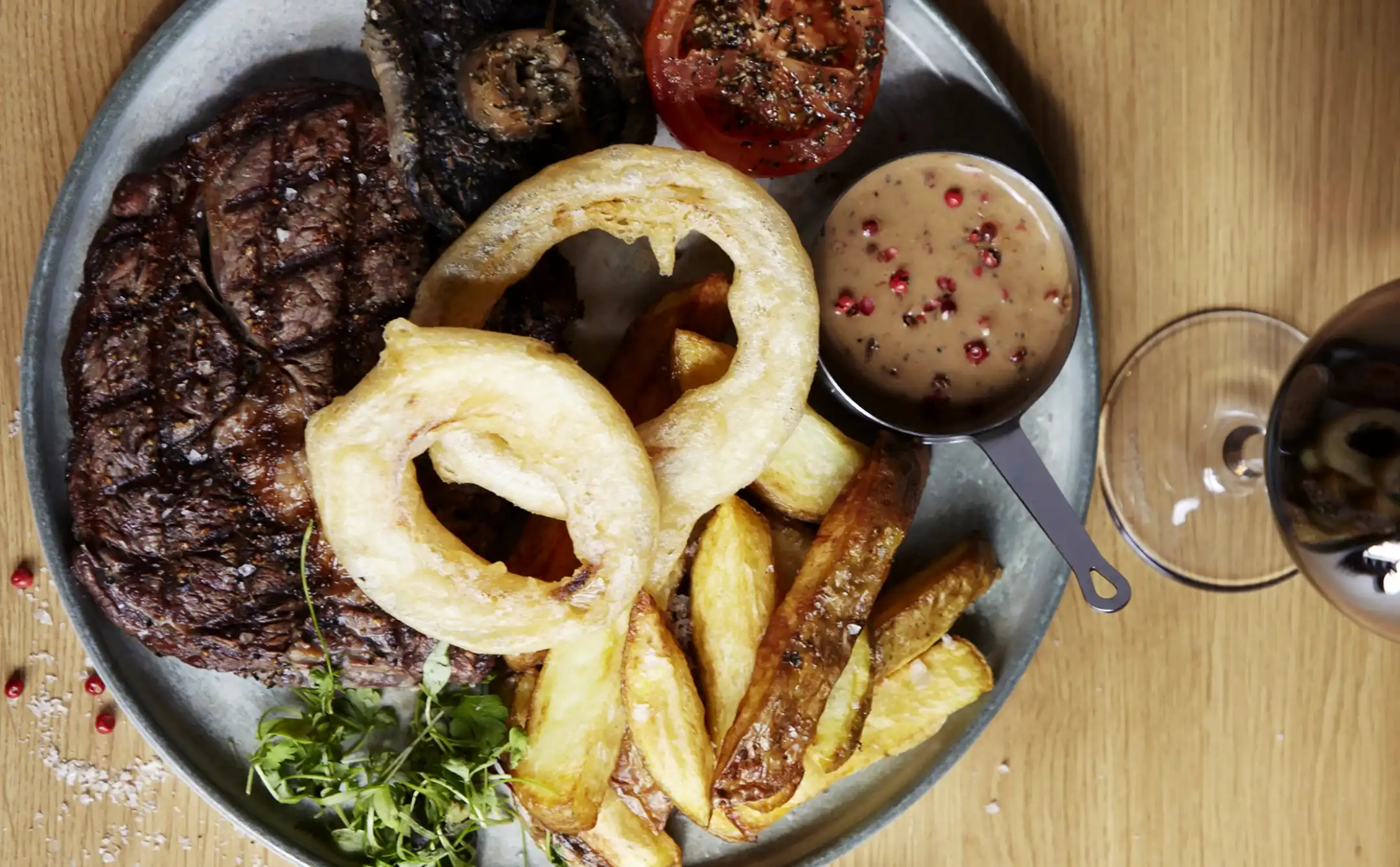 Steak, veg, chips and red wine